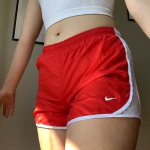 bright red Nike shorts